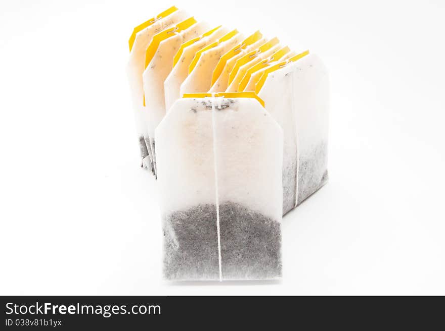 Tea bags with yellow labels