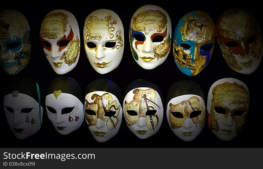 Different masks of the Carnival of Venice with a black background. Different masks of the Carnival of Venice with a black background