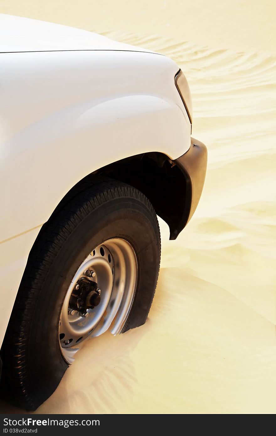 White car on the desert