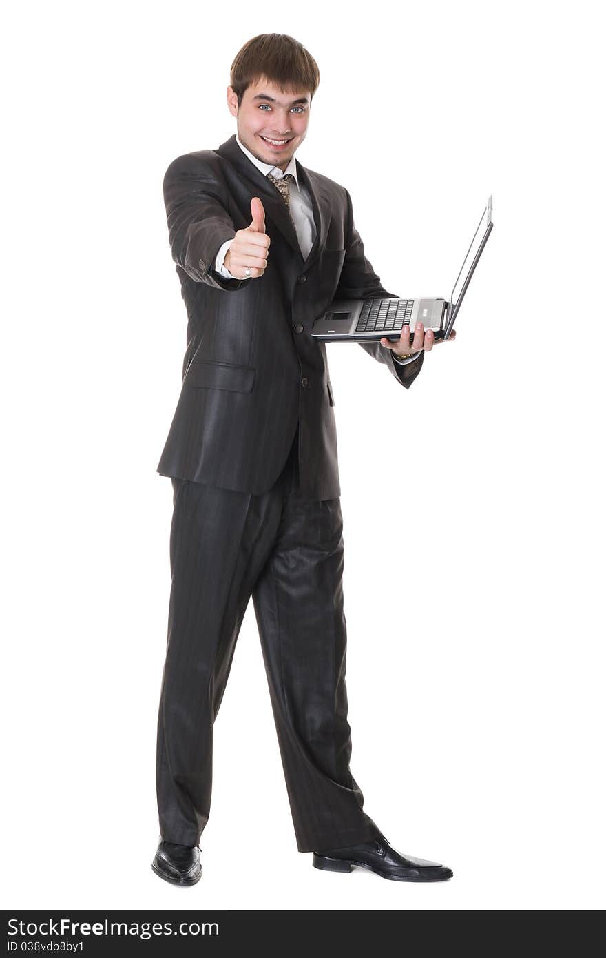 Businessman holding laptop and shows okay sign