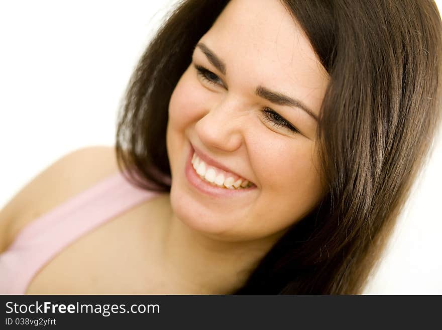 Young pretty woman's portrait on the white background