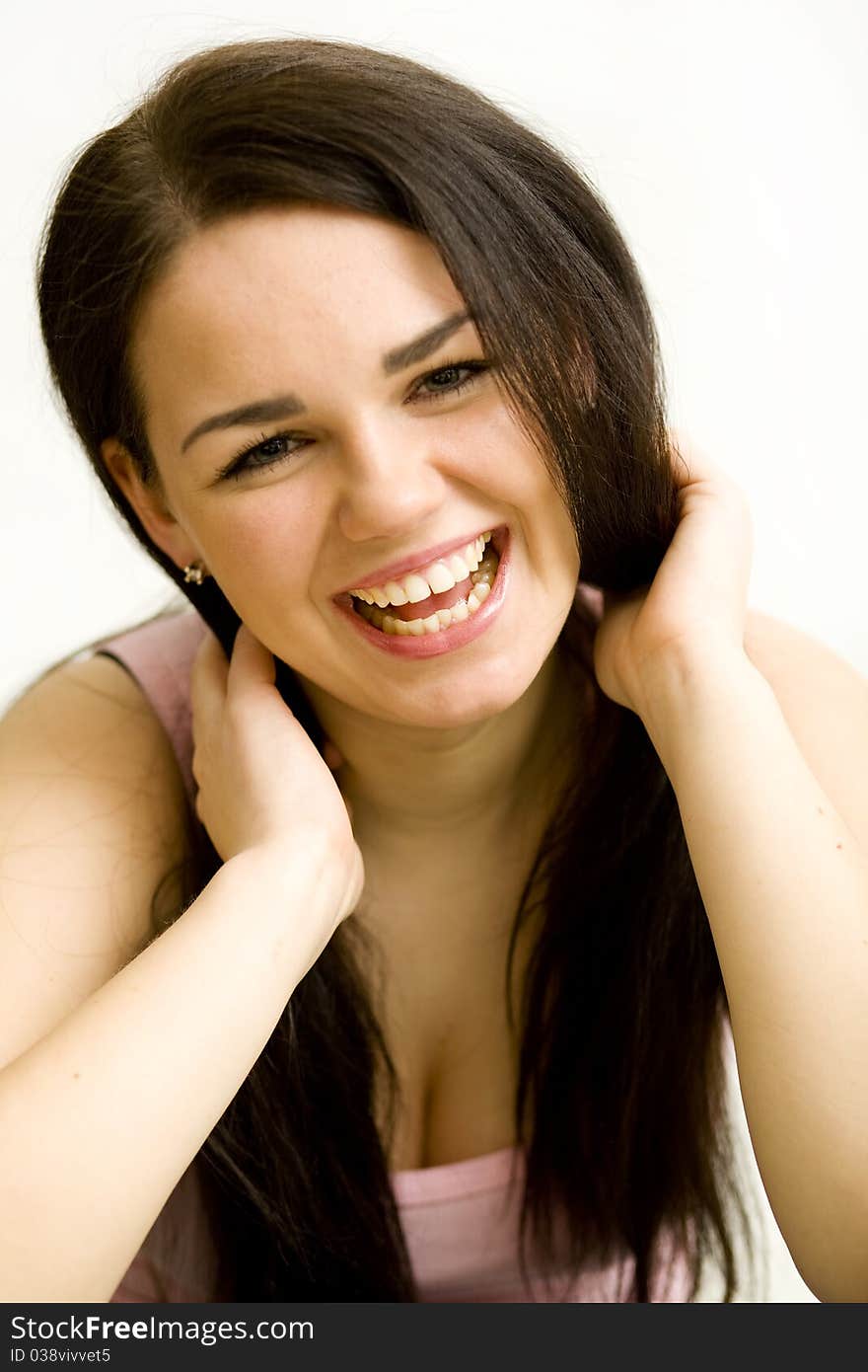 Young pretty woman's portrait on the white background