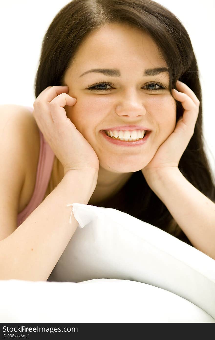 Woman laying down, relaxing in her bed