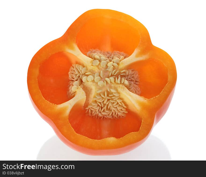 Half of orange sweet pepper with seeds. Half of orange sweet pepper with seeds