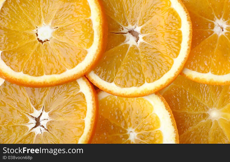 Oranges Slices are on board. Background. Texture.