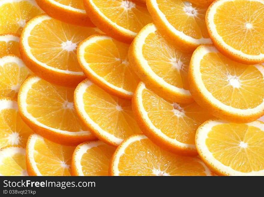 Oranges Slices are on board. Background. Texture.