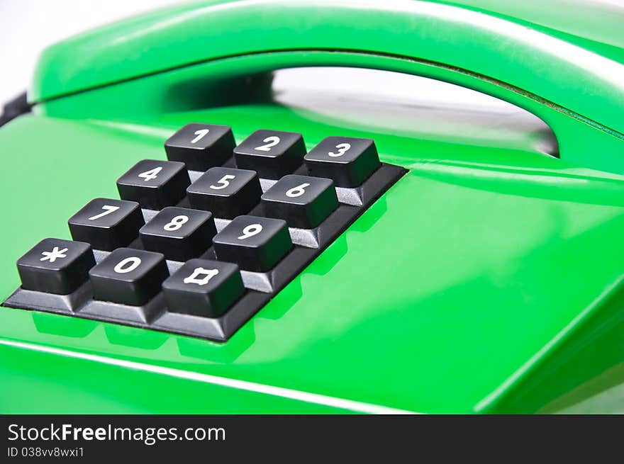 Green phone isolated on white background