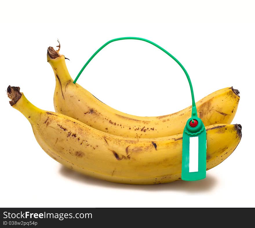 Banana with a label on a white background. Banana with a label on a white background