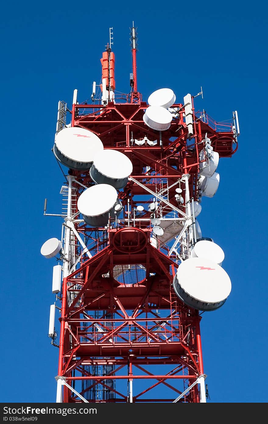 Communications Tower With Microwave Relays. Communications Tower With Microwave Relays