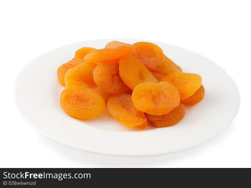 Apricots halves on white plate