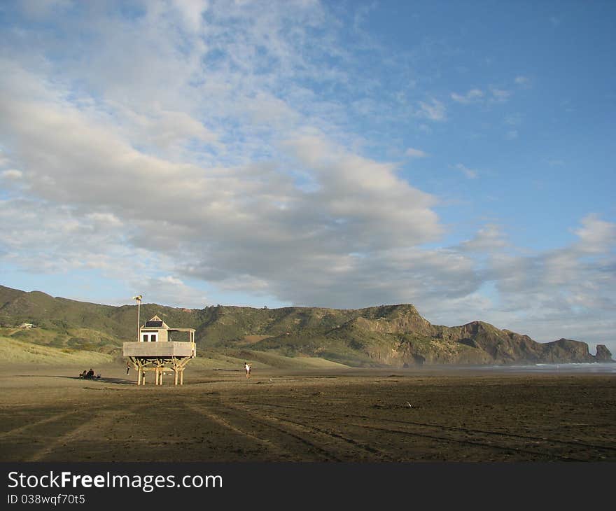 This is a wild West Coast beach in Auckland, New Zealand- very popular with surfers. This is a wild West Coast beach in Auckland, New Zealand- very popular with surfers.