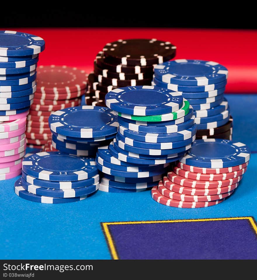 Set of gambling chips on poker table