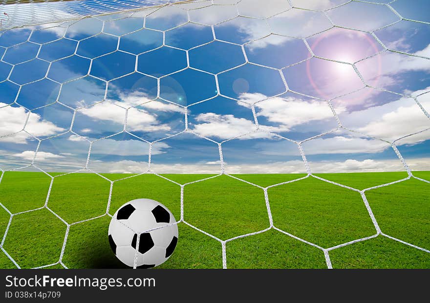 Soccer goal under the blue sky