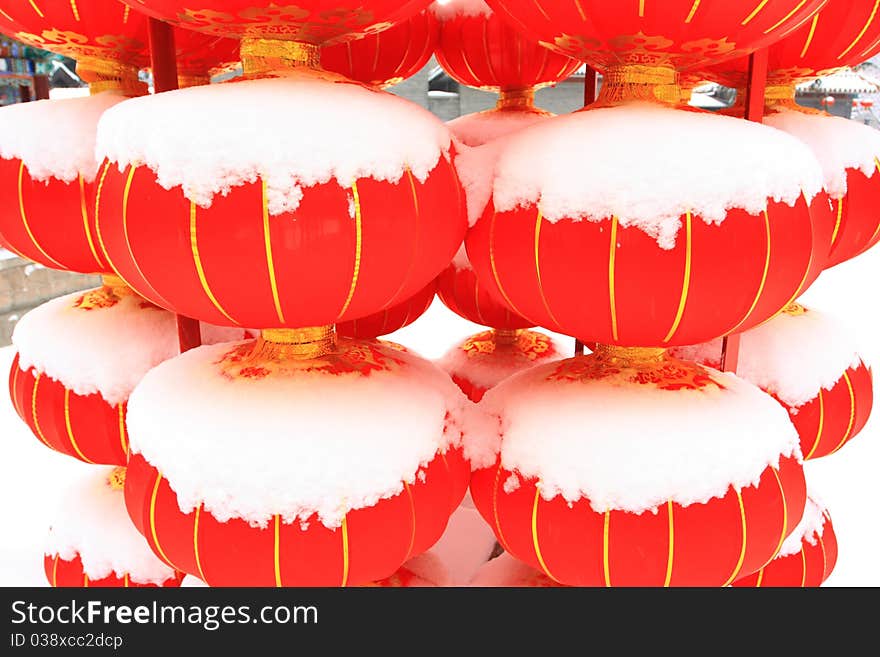 Chinese red lantern on snow