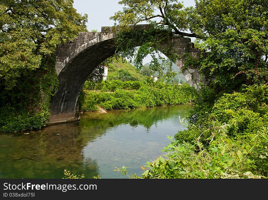 Ancient stone bridge in Guilin, China.