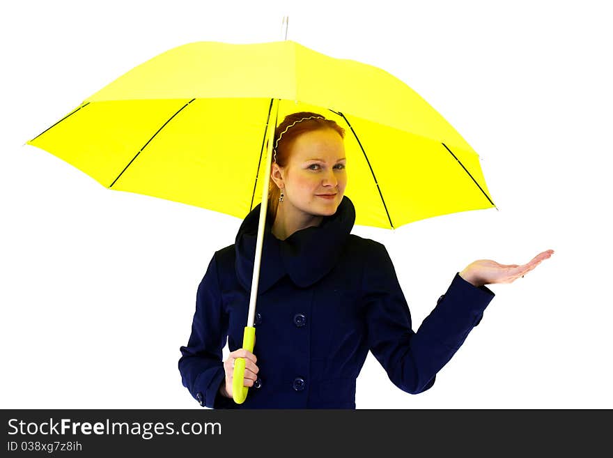 Redhead young woman holding an yellow umbrella. Redhead young woman holding an yellow umbrella