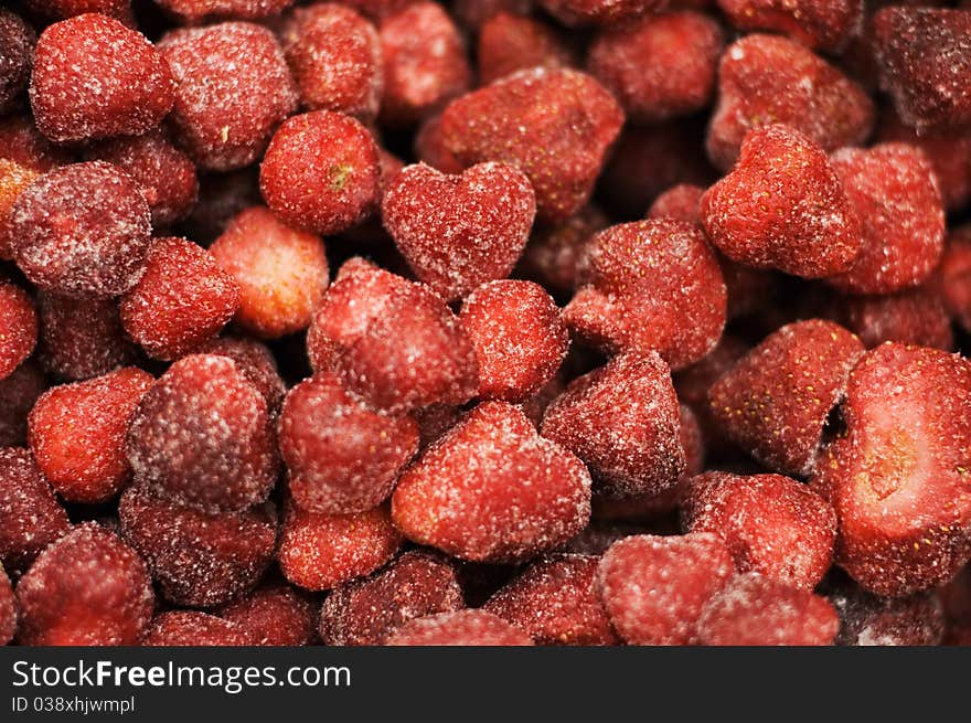 Background from the appetizing frozen strawberry