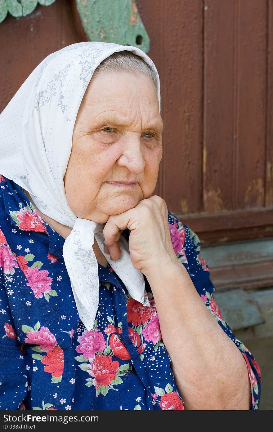 Portrait of the old woman outdoor