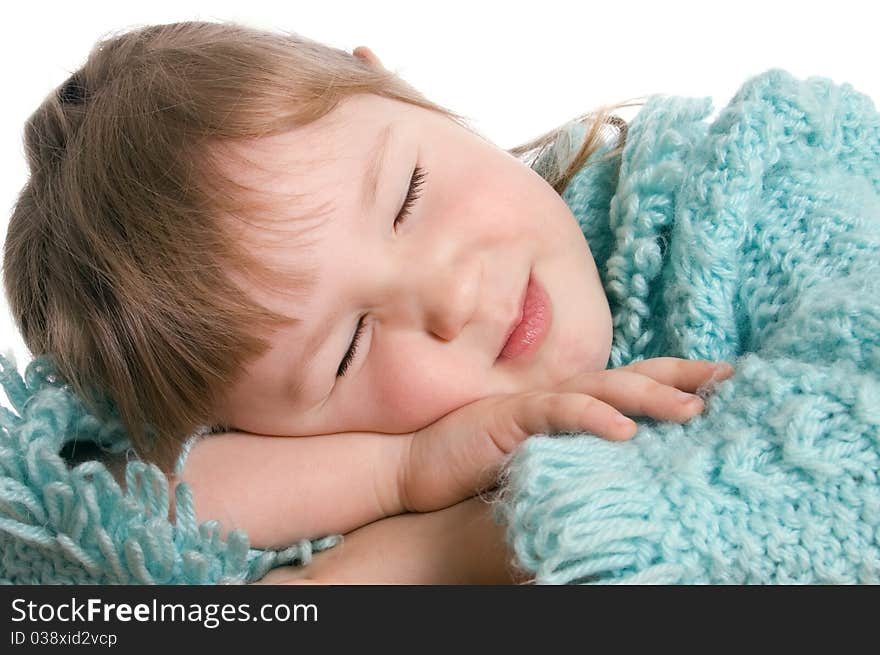 The little girl sleeps on a table