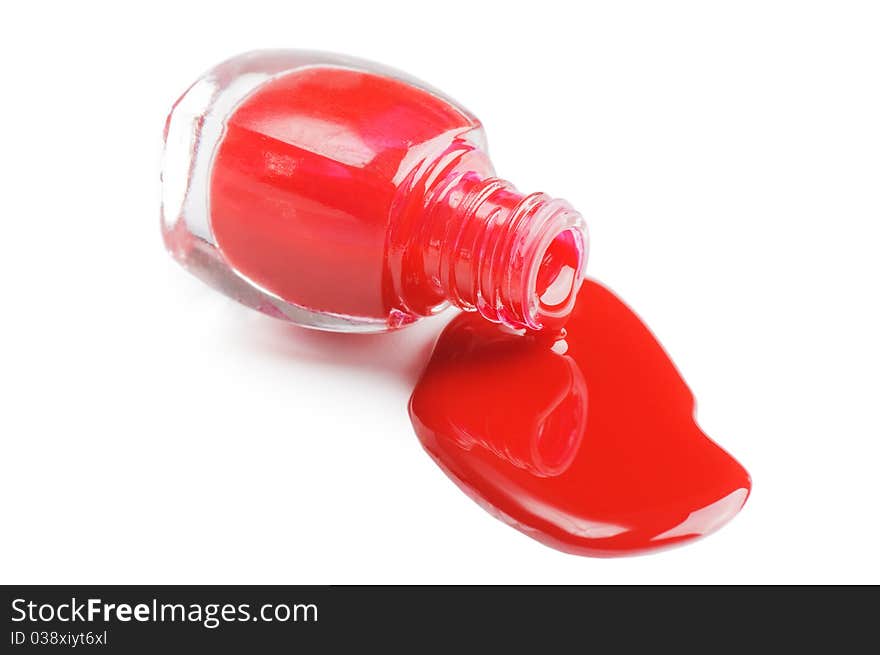 Red nail polish isolated on a white background