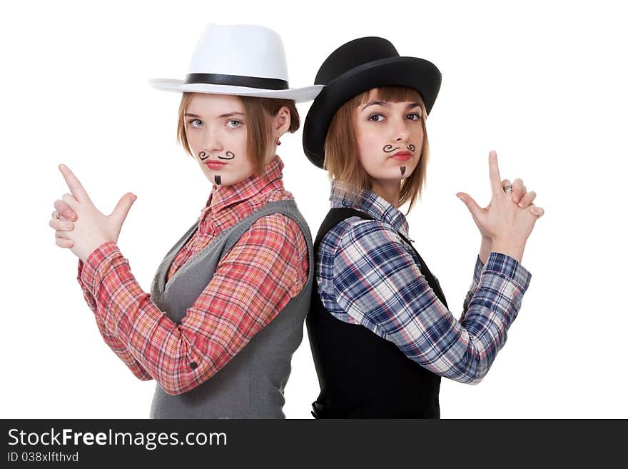 Two girls with painted mustaches and bowler hats on white background