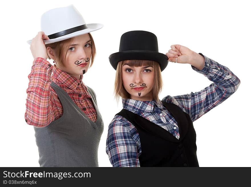 Two girls with painted mustaches and bowler hats on white background