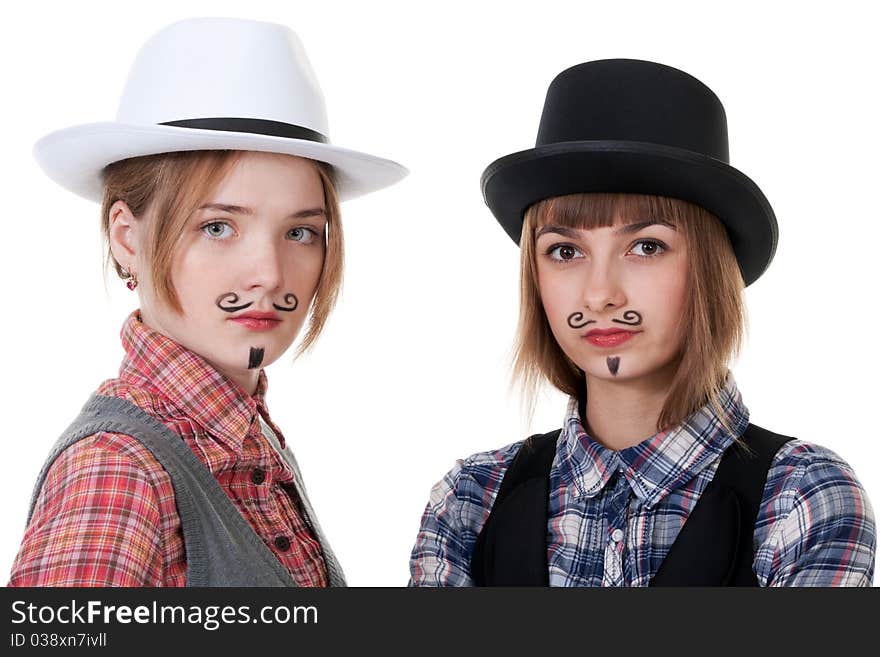 Two girls with painted mustaches and bowler hats on white background