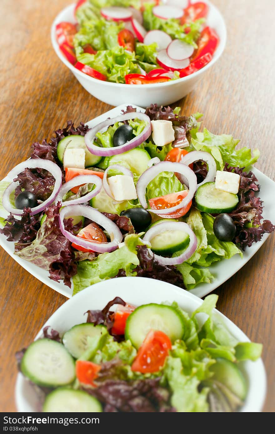 Healthy fresh salad setting on table.