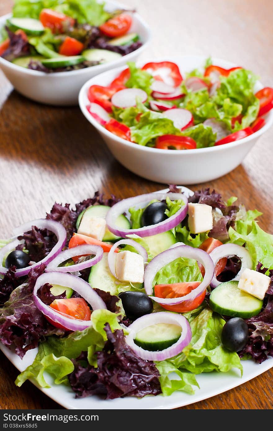 Healthy fresh salad setting on table.