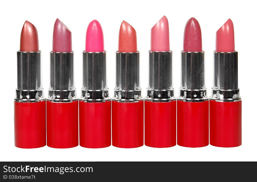 lipsticks abreast isolated on a white background