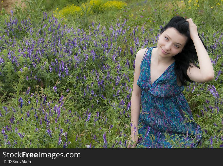 Young Black Hair Girl in Blue Flowers