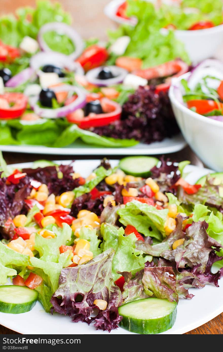 Healthy fresh salad setting on table.