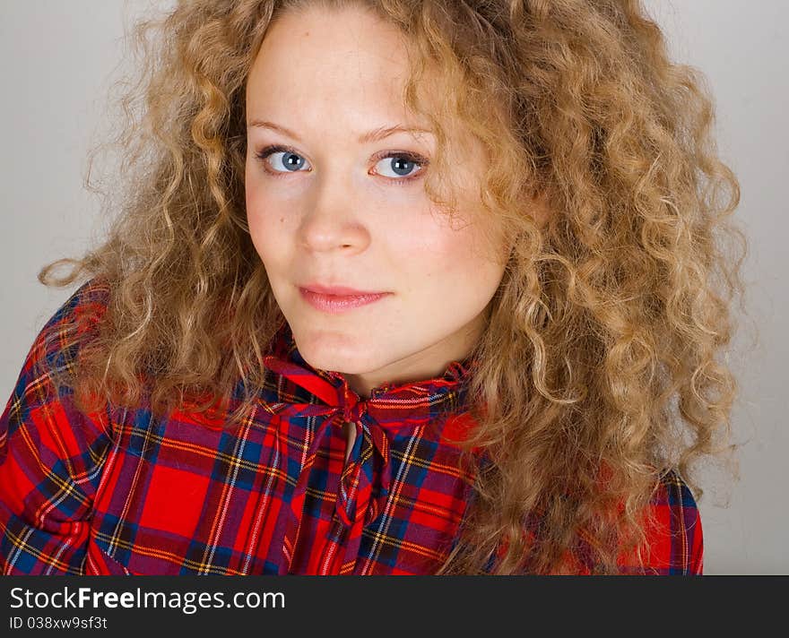 Portrait of beauty woman with blonde curly hairs. Portrait of beauty woman with blonde curly hairs