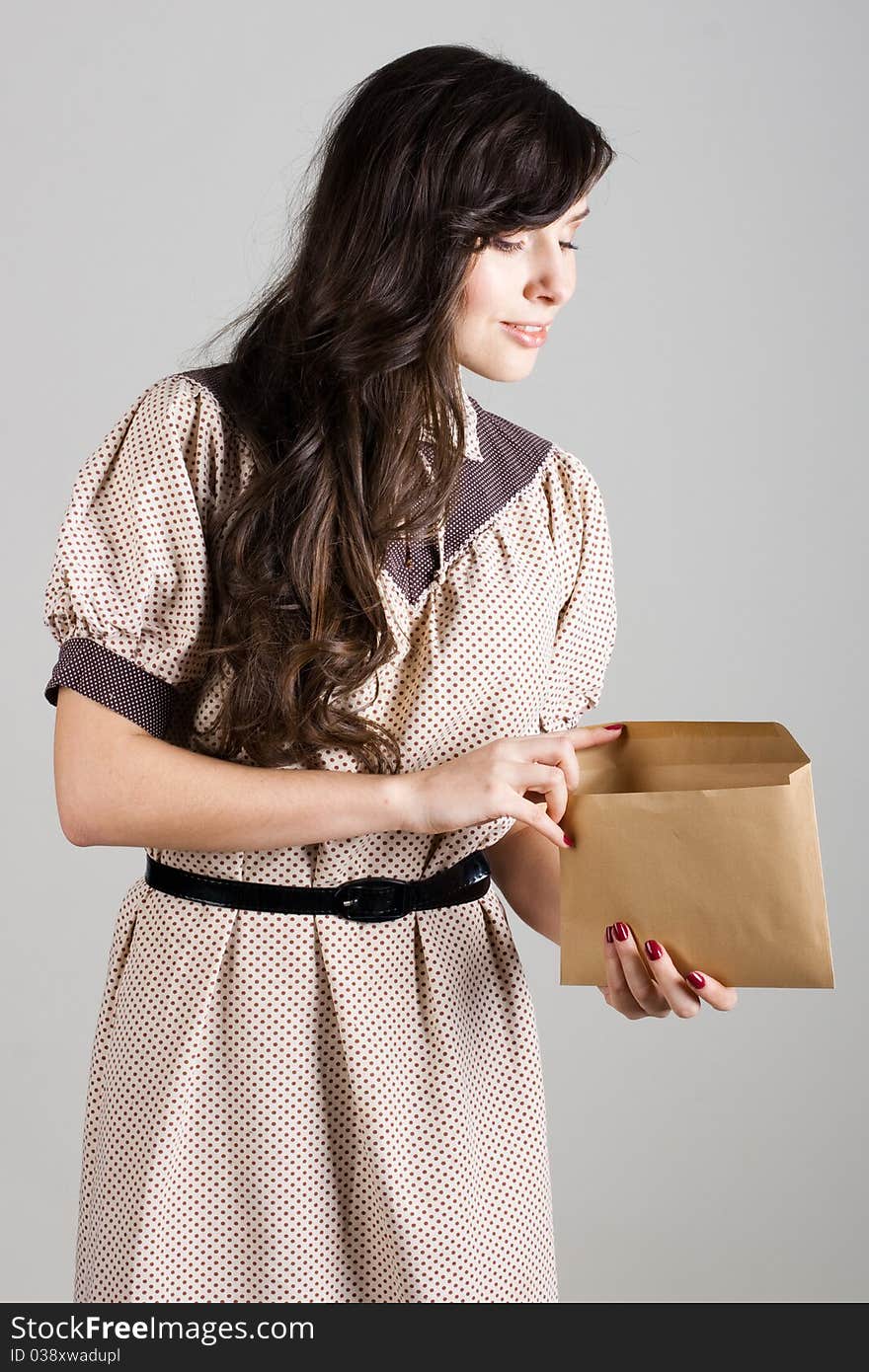 Portrait of beauty young woman with envelope