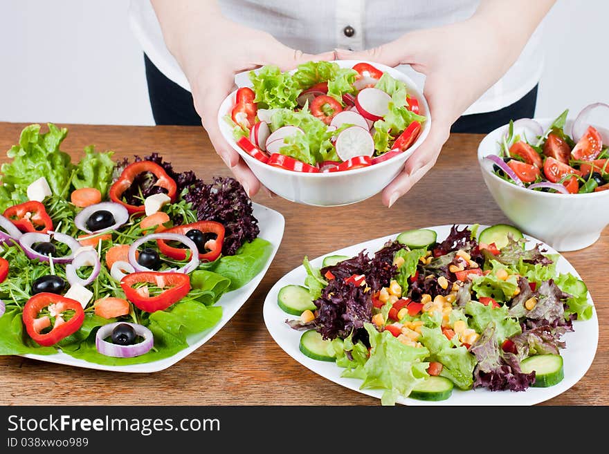 Healthy fresh salad setting on table.