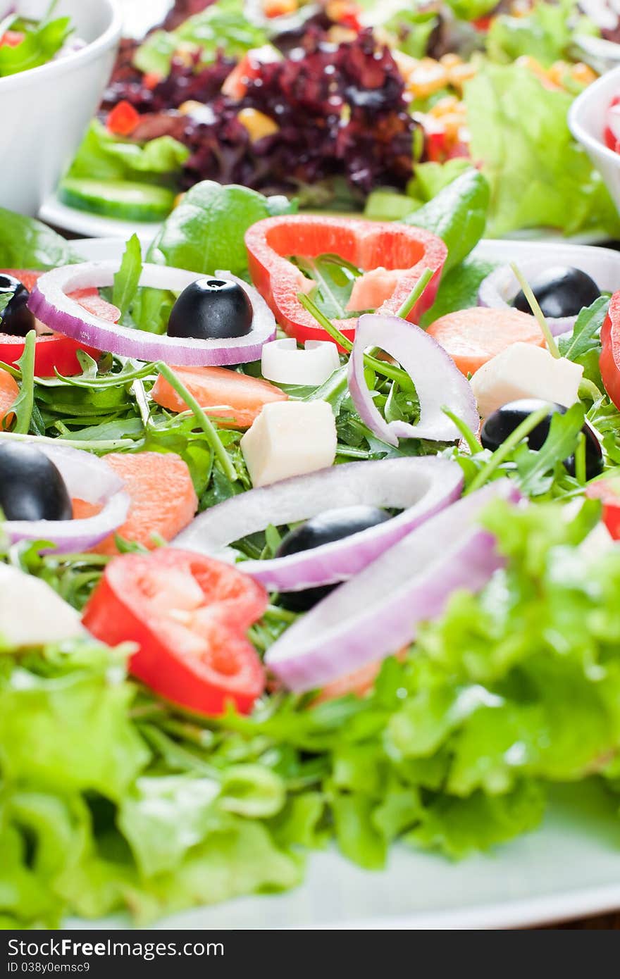 Healthy fresh salad setting on table.