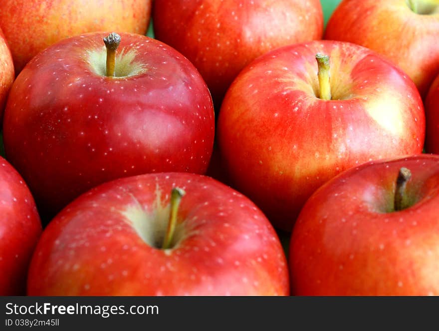 Close-up row of red apples. Close-up row of red apples