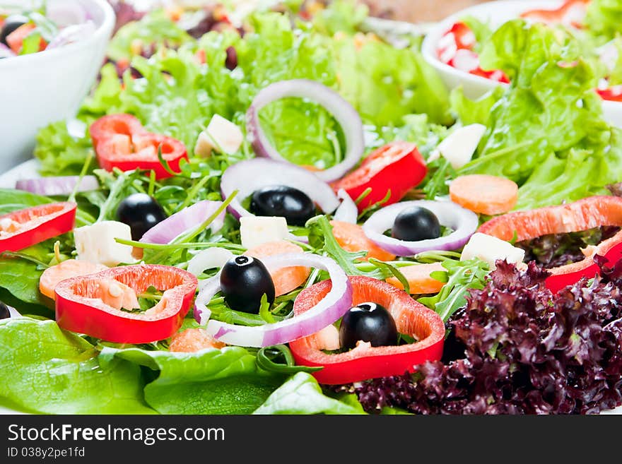 Healthy fresh salad setting on table.