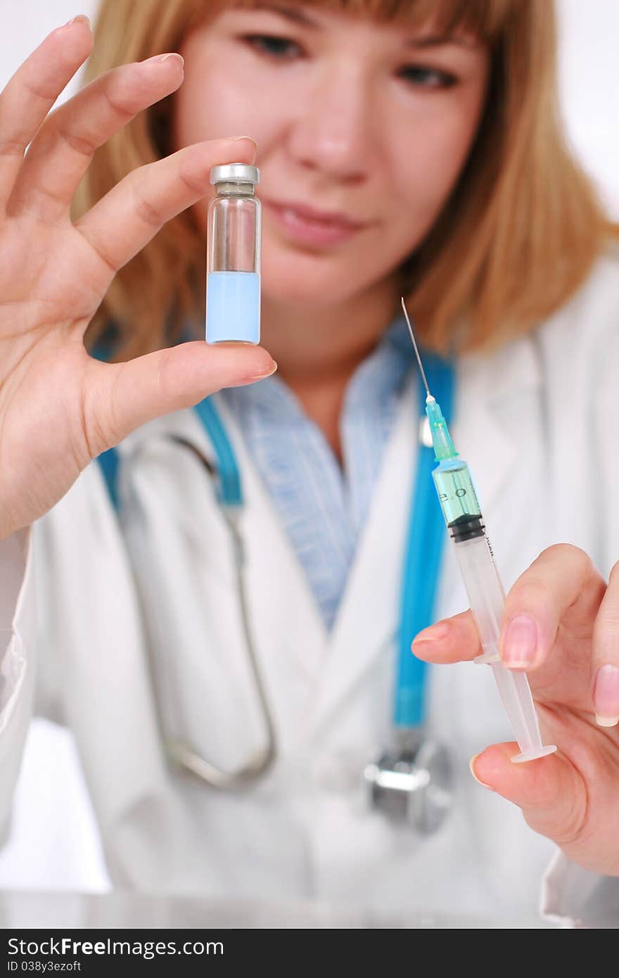 Vaccination concept. Smiling doctor is giving vaccine.