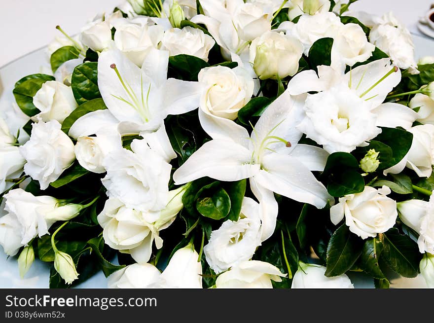 The wedding decoration with white lily and rose