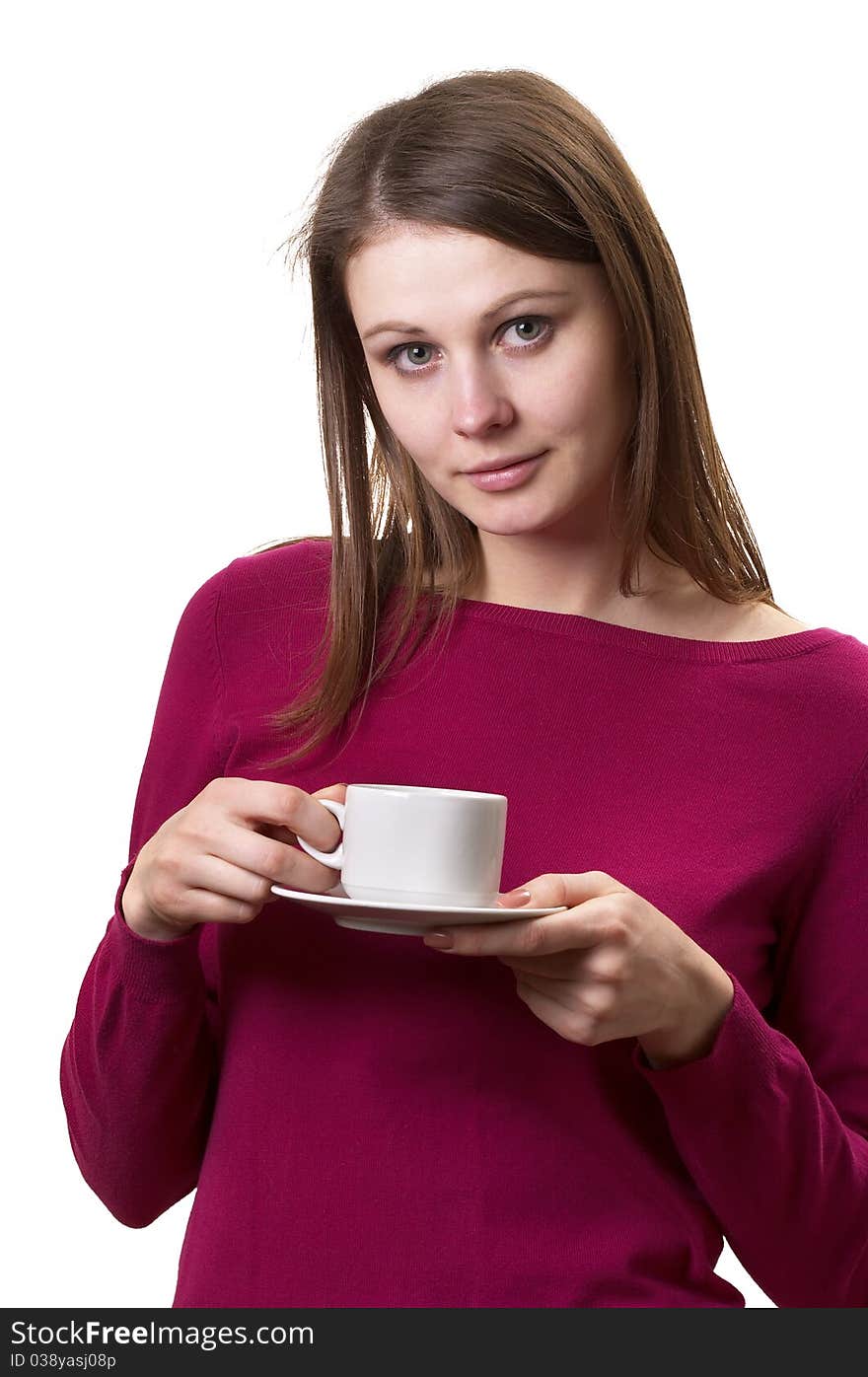 Young woman with white cup and saucer in the hands isolated over white background. Young woman with white cup and saucer in the hands isolated over white background