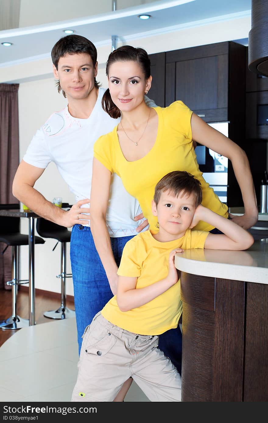 Happy parents with their son at home. Happy parents with their son at home.