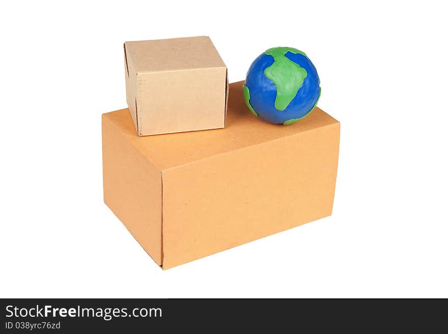 Two packing boxes and model of the globe on a white background. Two packing boxes and model of the globe on a white background