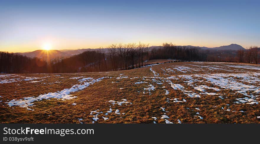 Central Serbia panorama, fields and meadows of a village.