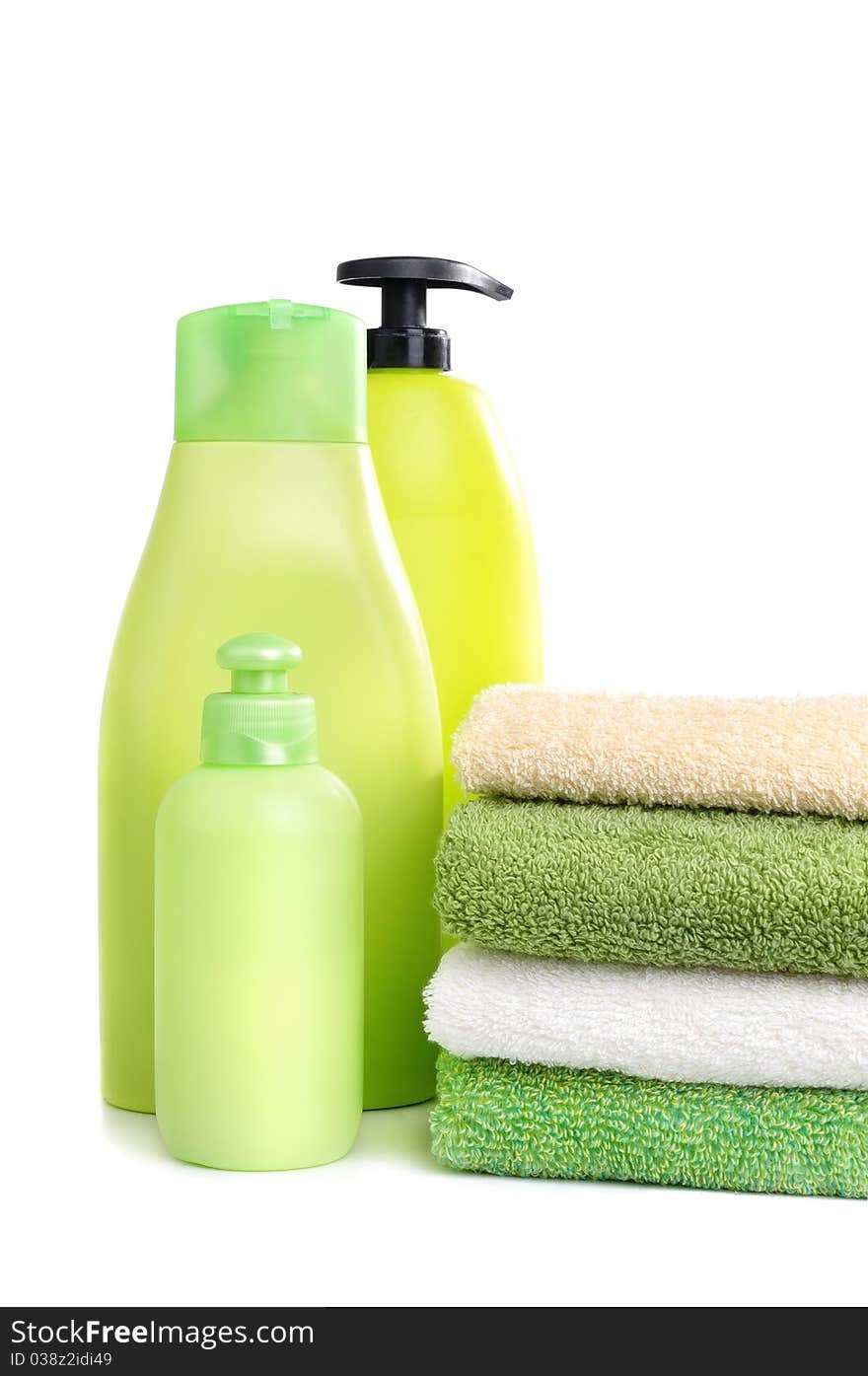 Towels and green plastic bottles