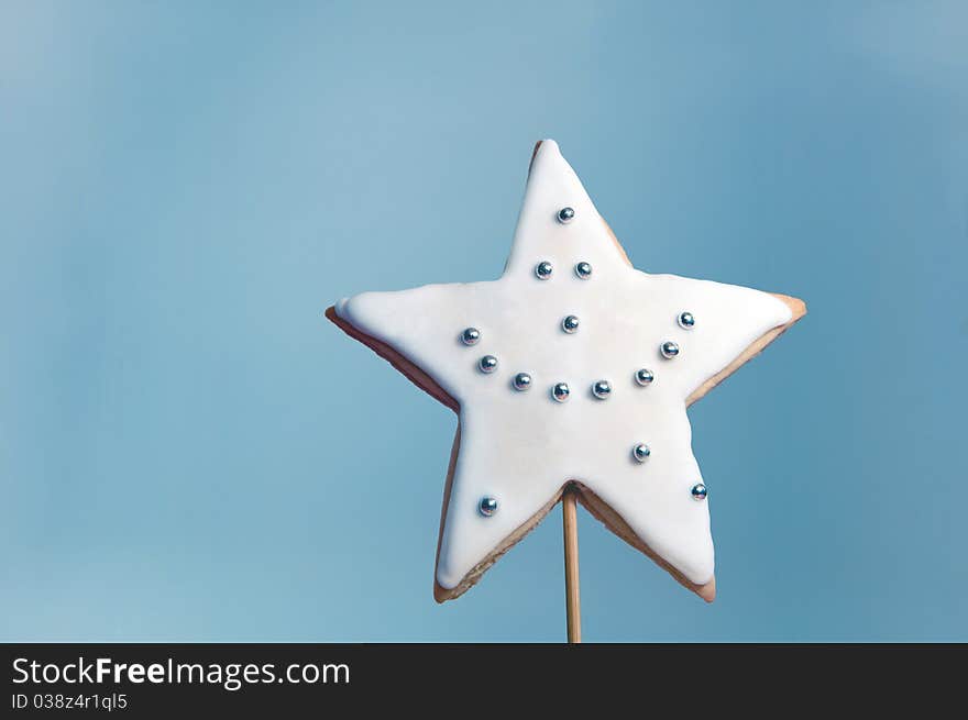 Happy smiling Star against a blue background. Happy smiling Star against a blue background.