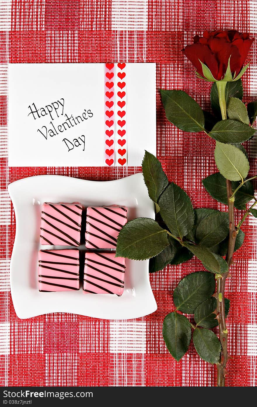 Valentine's day card with rose and cakes