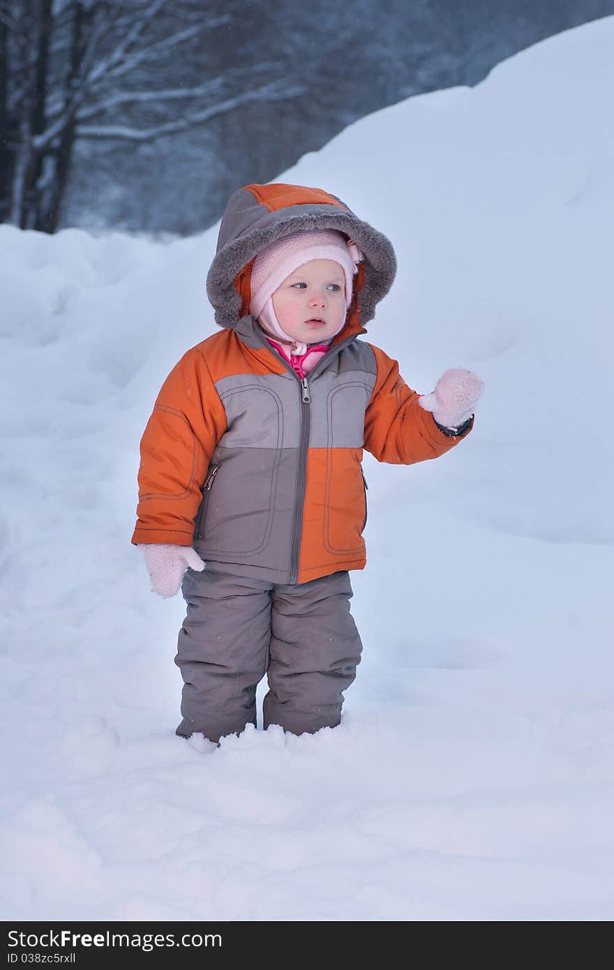 Cute Baby Walk In Deep Snow In Winter Evening