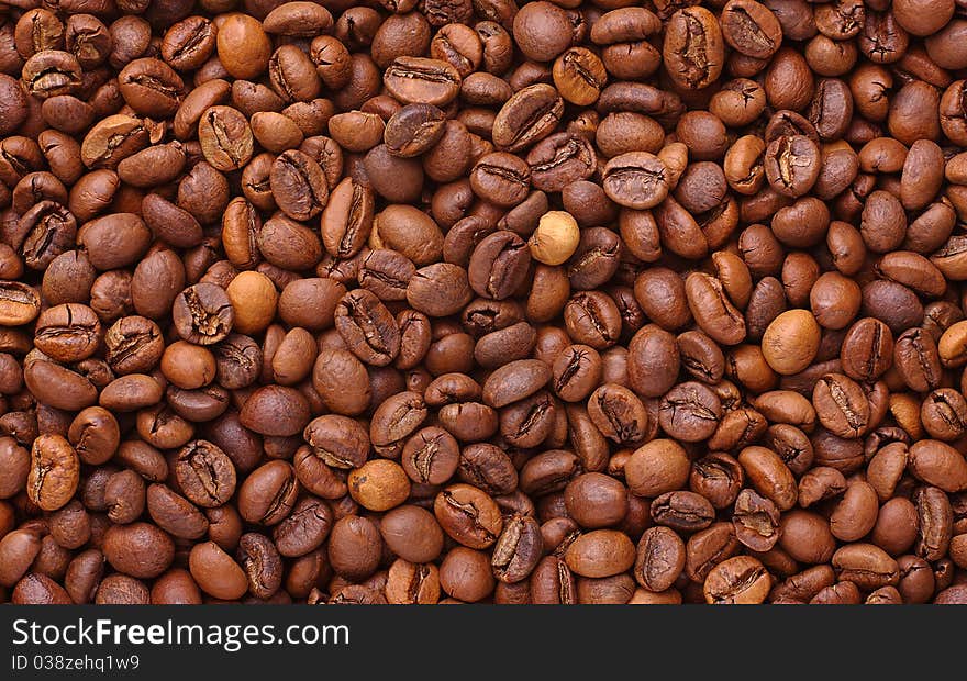 The Arabica. Roasted coffee beans. Background. Texture.