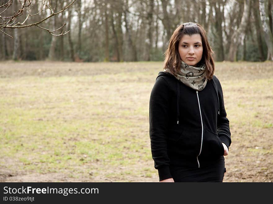 Young woman standing on the grass